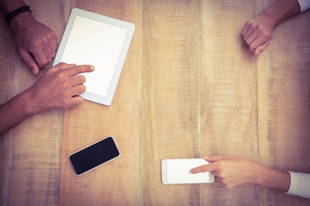 A split-screen showing a hand reporting a social media post on one side and a person filing a report with a government agency on the other, symbolizing the dual approach to reporting disinformation.