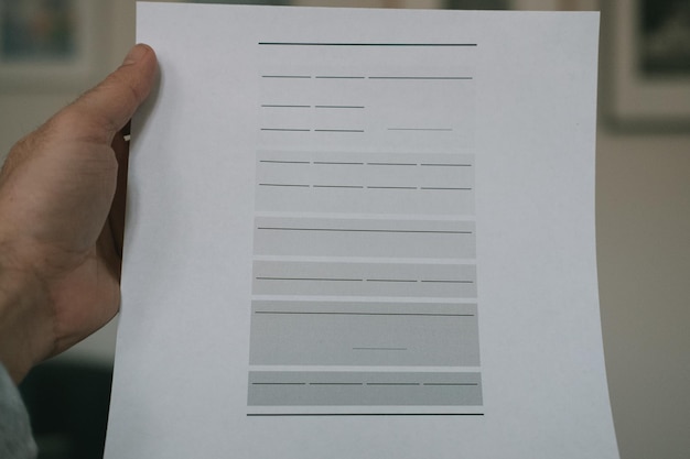 A close-up of an Explanation of Benefits (EOB) document, highlighting the sections explaining the denial reason and the appeal process, with a hand pointing to the relevant information.