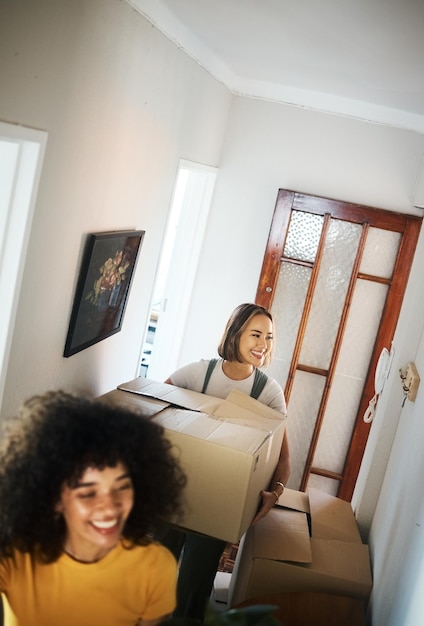 A person receiving keys to a new apartment from a housing counselor, symbolizing the successful acquisition of permanent housing through HUD programs. Both are smiling in a bright, modern office.