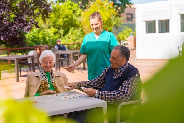 A community health worker assisting an elderly patient in a rural area with setting up a telehealth appointment on a tablet. The image highlights efforts to bridge the digital divide and improve access to healthcare for underserved populations.