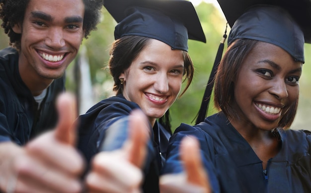 A diverse group of students celebrating graduation, representing the diverse beneficiaries of student loan forgiveness programs and the positive impact on their lives.