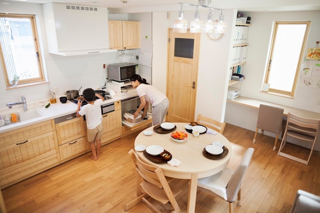 Interior of a clean and well-maintained public housing apartment, showing a cozy living space and a functional kitchen area.